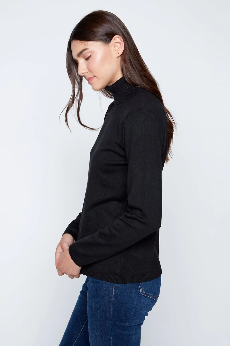 Le pull col roulé uni