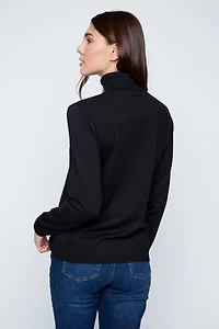 Le pull col roulé uni