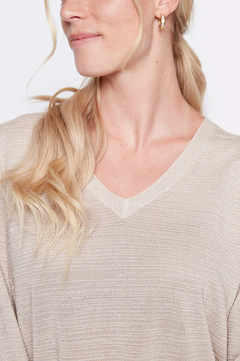 Le pull texturé avec détails en lurex