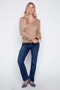 Le pull à détail nœud