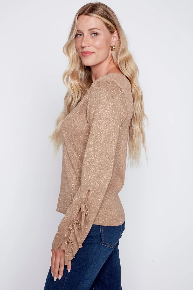 Le pull à détail nœud