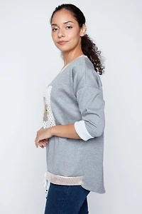 Foil sunflower with crochet applique sweater