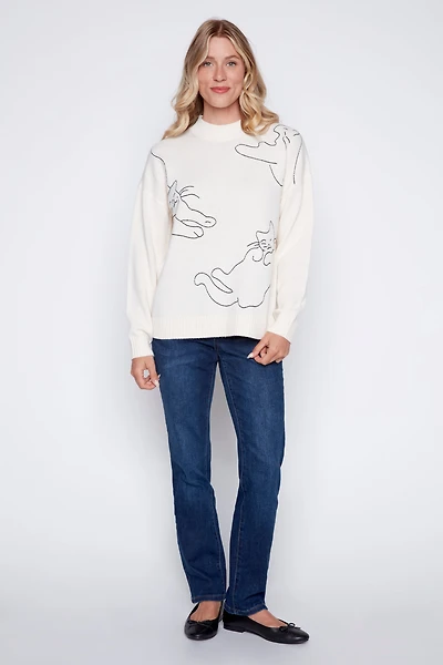 Le pull à motif chat