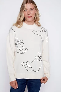 Le pull à motif chat