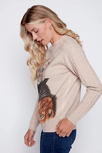 Le pull en tricot à motif trois chats