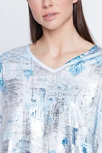 Le haut à imprimé floral métallisé