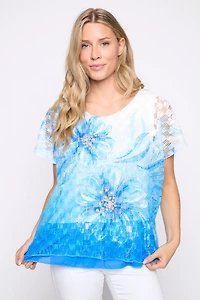 Le haut crocheté fleuri