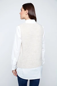le gilet à boutons sur devant