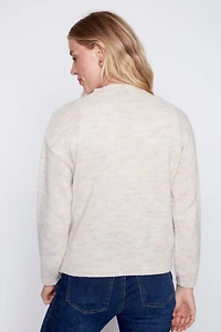 Le pull à motif ourson