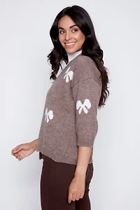Le cardigan à motif nœud