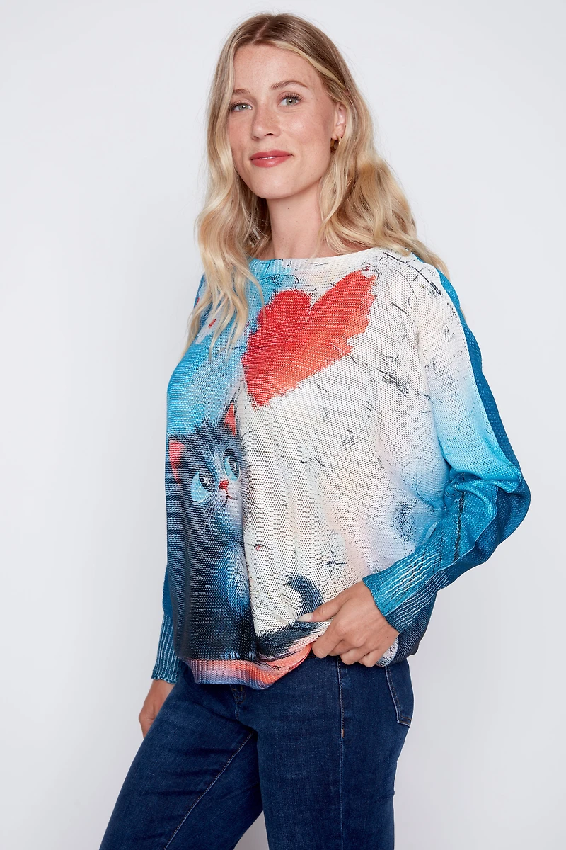 Kitten with heart print sweater