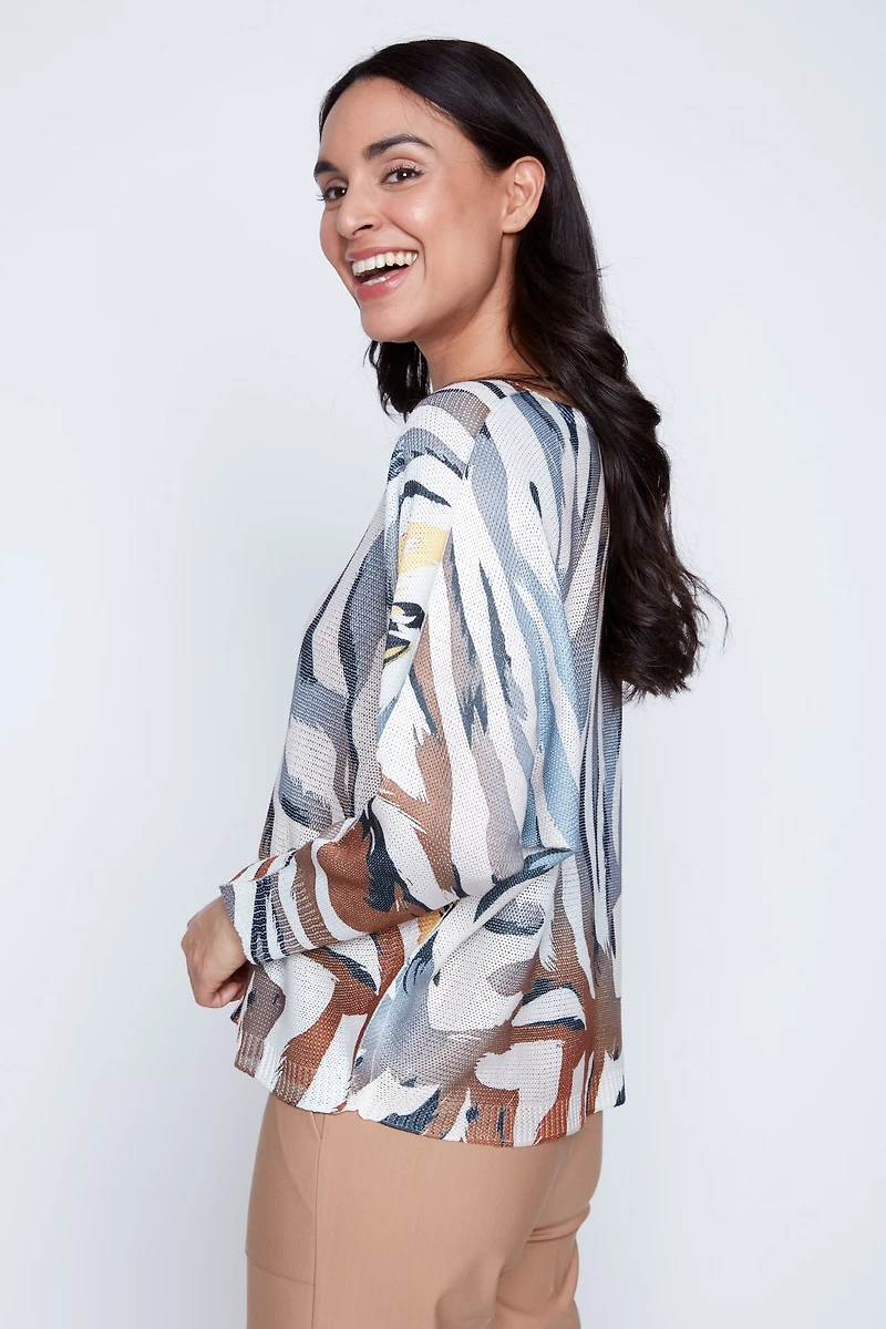 Le pull à rayures animales