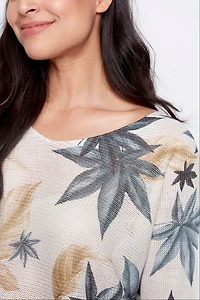 Le pull à imprimé feuilles