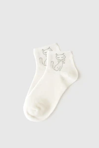 Les chaussettes avec chat brodé et nœud rouge