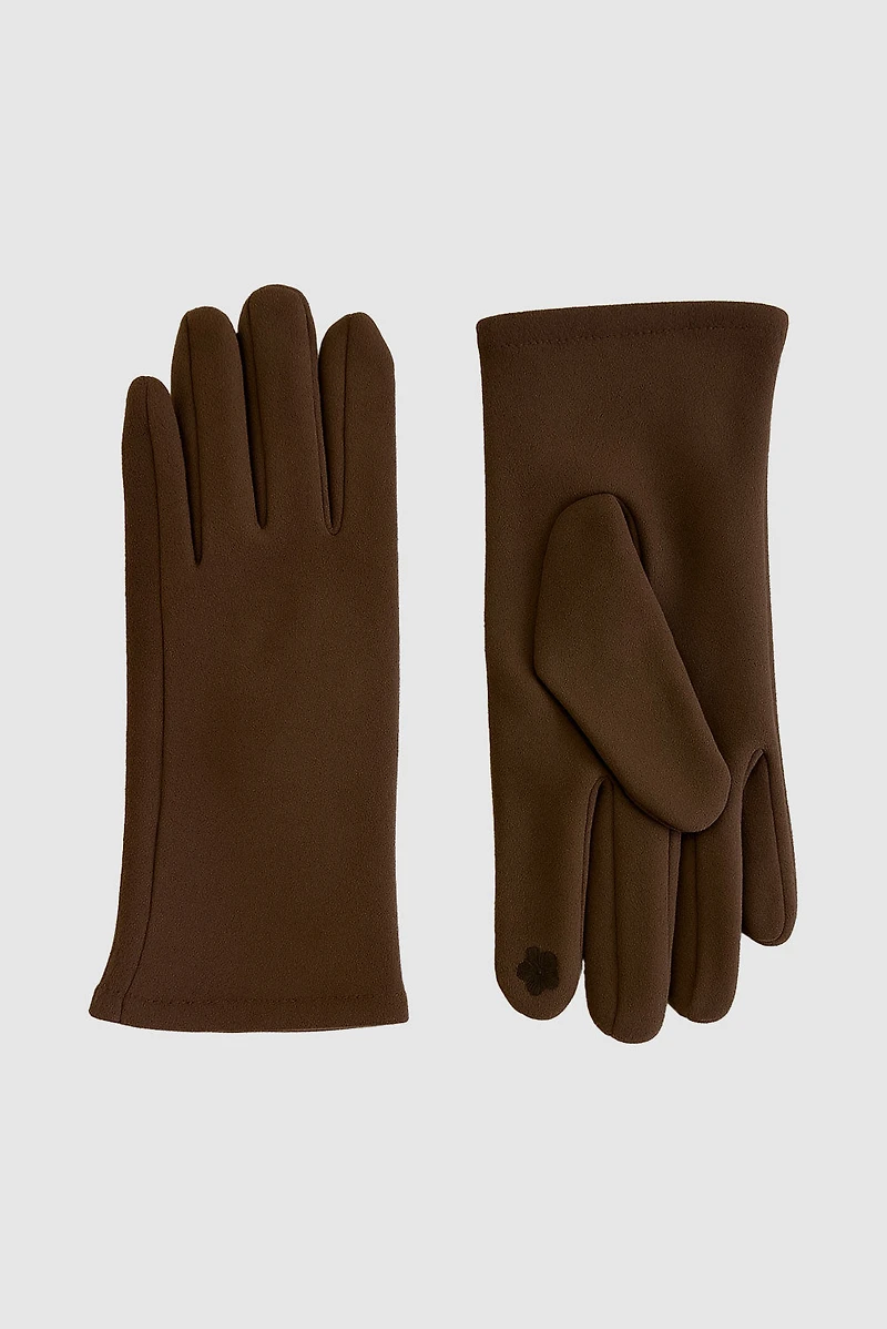 Les gants en tricot uni