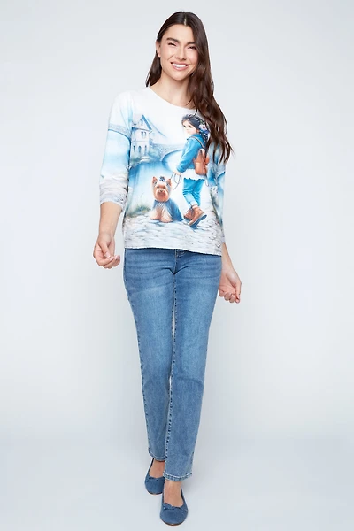 Little girl with dog print knit top