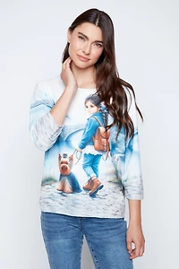 Little girl with dog print knit top
