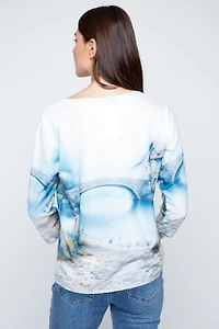 Little girl with dog print knit top