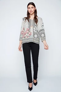 Le pull à imprimé mosaïque de roses grecques