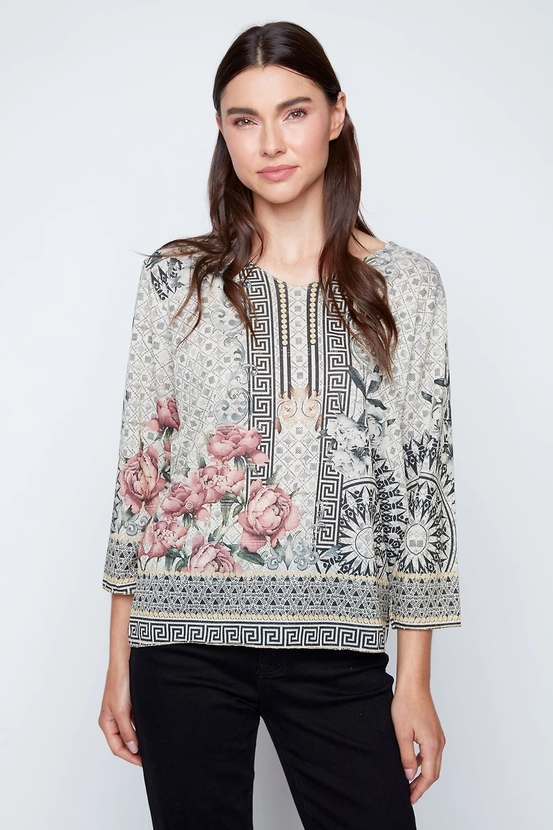 Le pull à imprimé mosaïque de roses grecques