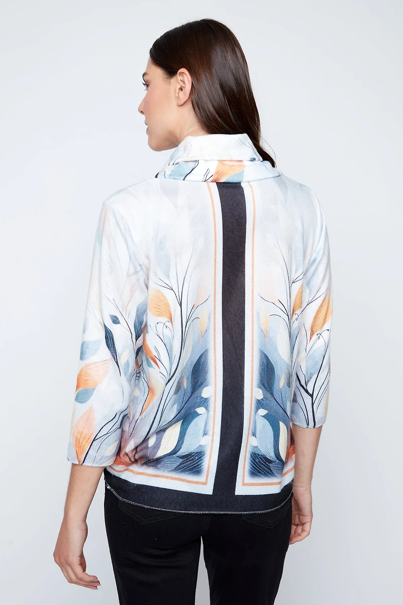 Le pull à col bénitier imprimé feuilles