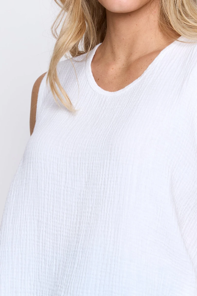 Le haut uni en gaze de coton