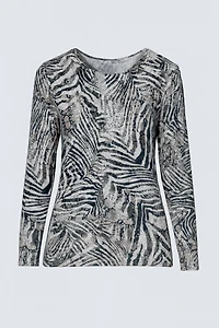 Le haut en tricot à imprimé zèbre et fleurs
