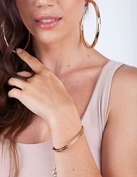 Boucles d’oreilles en tube surdimensionné en or poli