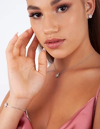 Collier, bracelet et boucles d’oreilles en zirconie cubique en argent