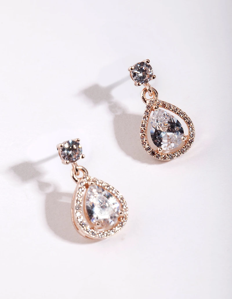 Boucles d’oreilles en forme de poire simulant le diamant encerclées