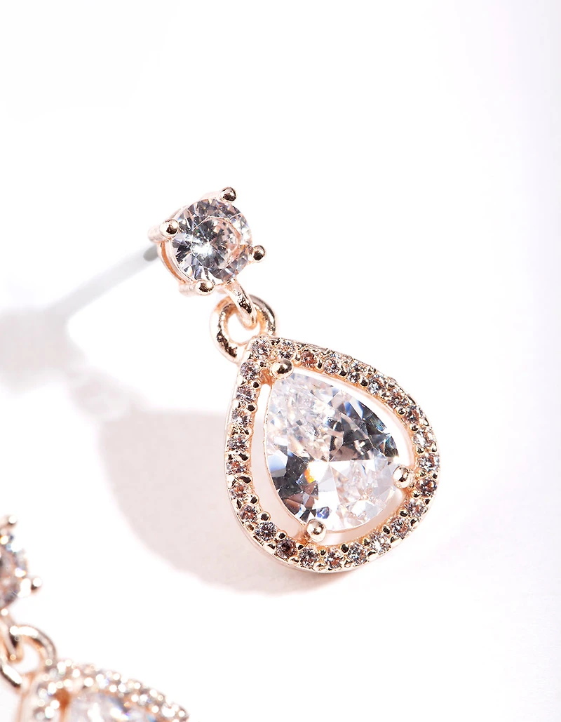 Boucles d’oreilles en forme de poire simulant le diamant encerclées