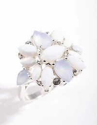 Bague fleur en pierre argentée et blanche