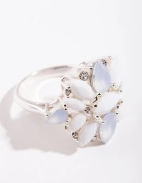 Bague fleur en pierre argentée et blanche