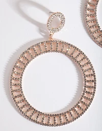 Boucles d’oreilles en disque découpé en or rose