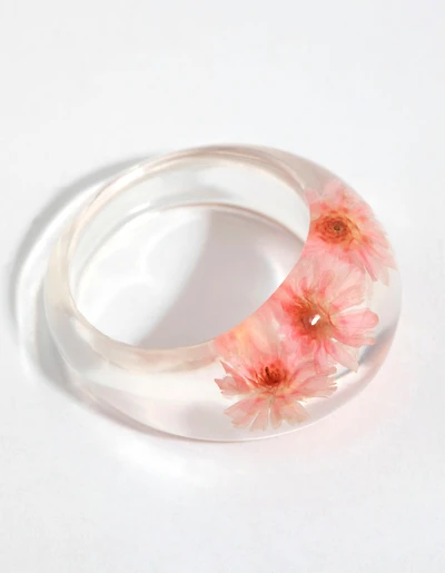 Anneau de marguerite en plastique rose