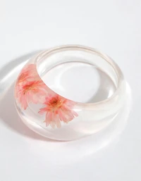Anneau de marguerite en plastique rose