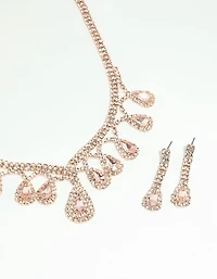 Coffret collier et boucles d’oreilles en diamant en or rose