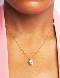 Coffret de colliers et boucles d’oreilles simulant diamants en or