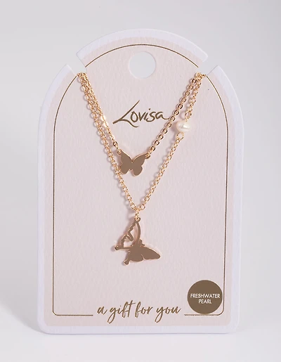 Collier de station en perles en or et papillons