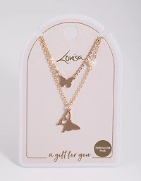 Collier de station en perles en or et papillons