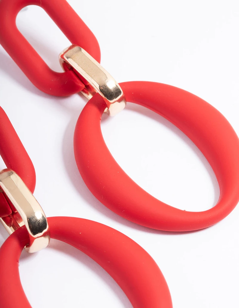 Boucles d’oreilles tombantes à maillons recouvertes de caoutchouc rouge