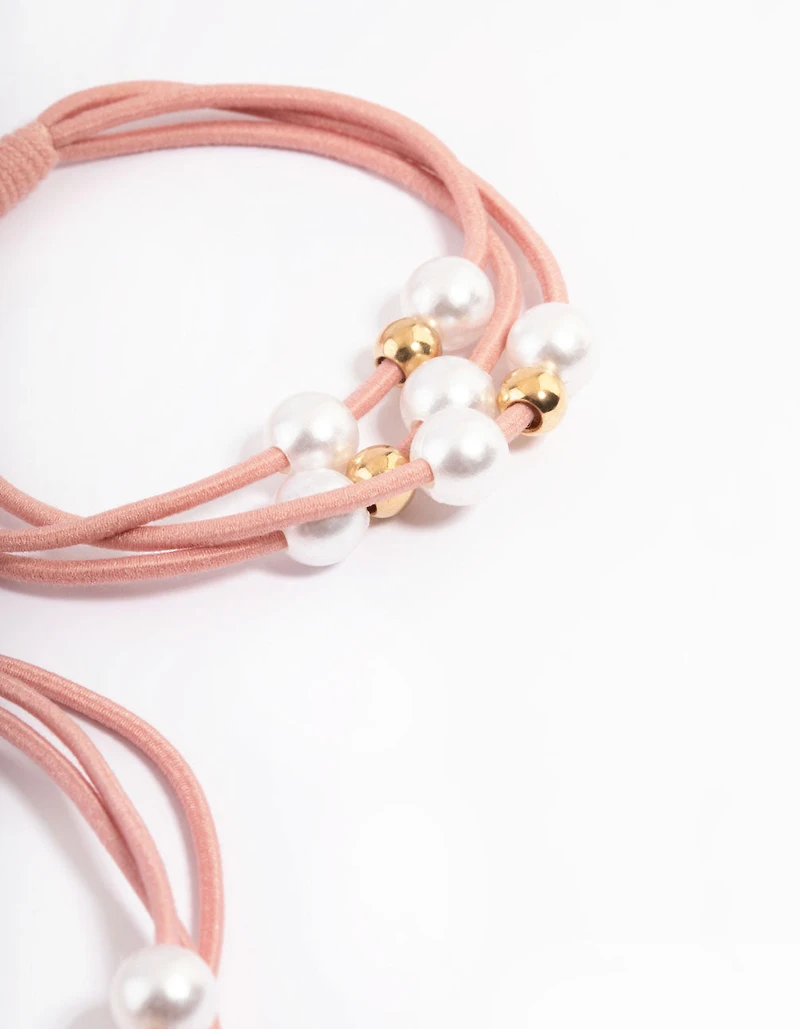 Paquet d’élastique à cheveux en tissu rose avec perles et perles