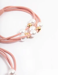 Paquet d’élastique à cheveux en tissu rose avec perles et perles