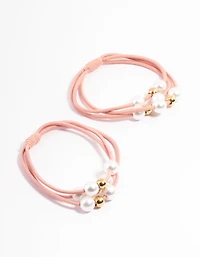 Paquet d’élastique à cheveux en tissu rose avec perles et perles