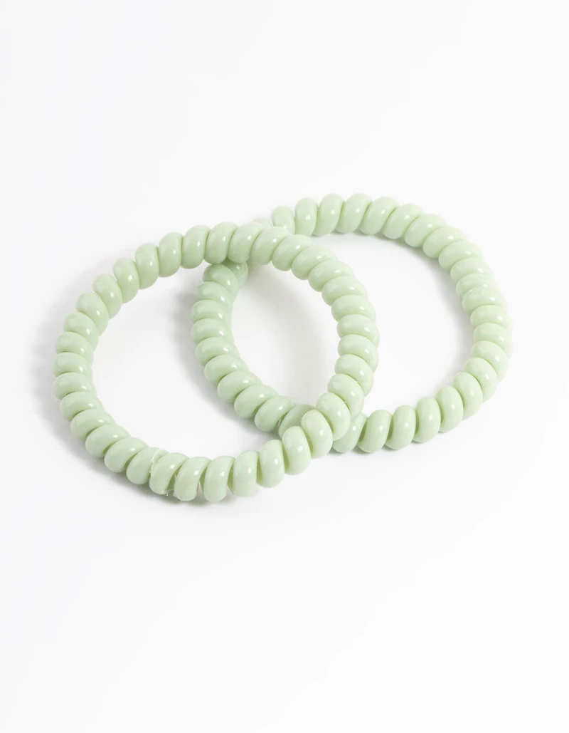 Sachet spiralé en plastique vert pour cheveux étroits