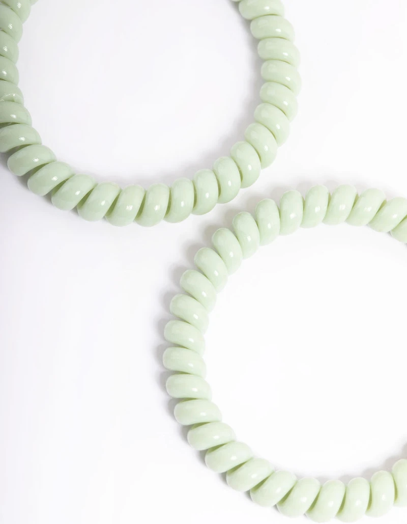 Sachet spiralé en plastique vert pour cheveux étroits