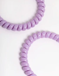 Pack spiralé en plastique violet pour cheveux étroits
