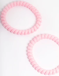 Pack spiralé en plastique rose à cheveux étroits