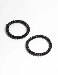 Sachet spiralé en plastique noir à cheveux étroits