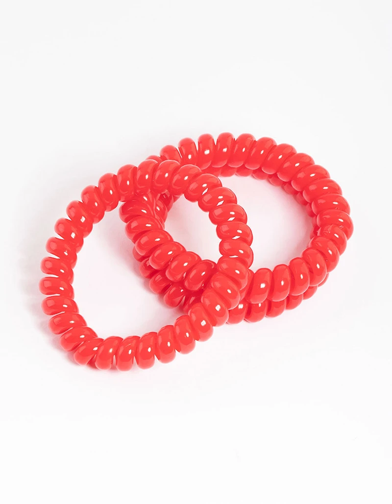 Pack spiralé en plastique rouge pour grands cheveux